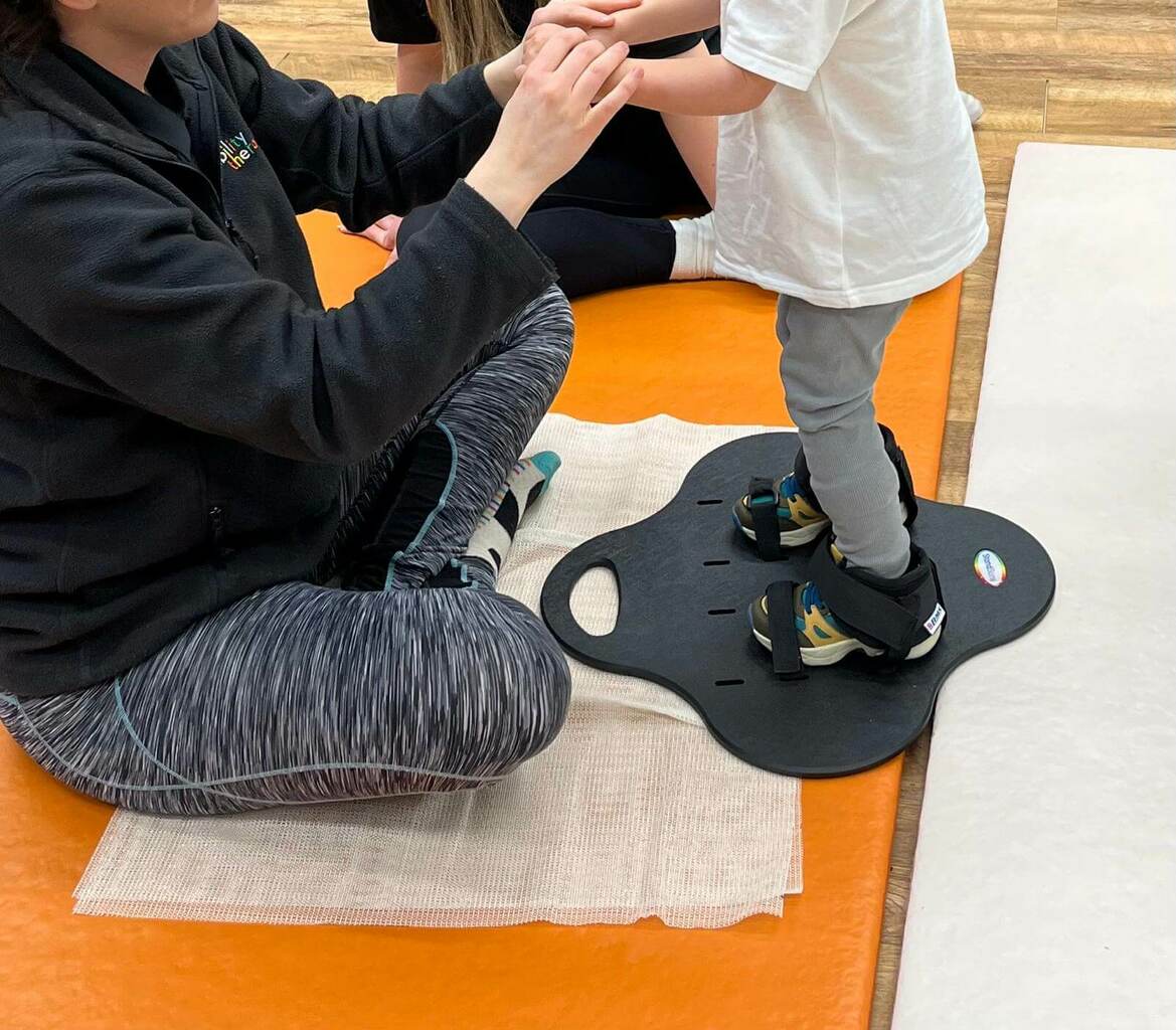 StandSure therapy aid being used in pediatric stroke rehabilitation